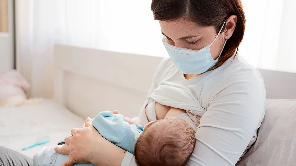 <div class="paragraphs"><p>Omicron positive mother should breastfeed the baby while wearing a mask.</p></div>
