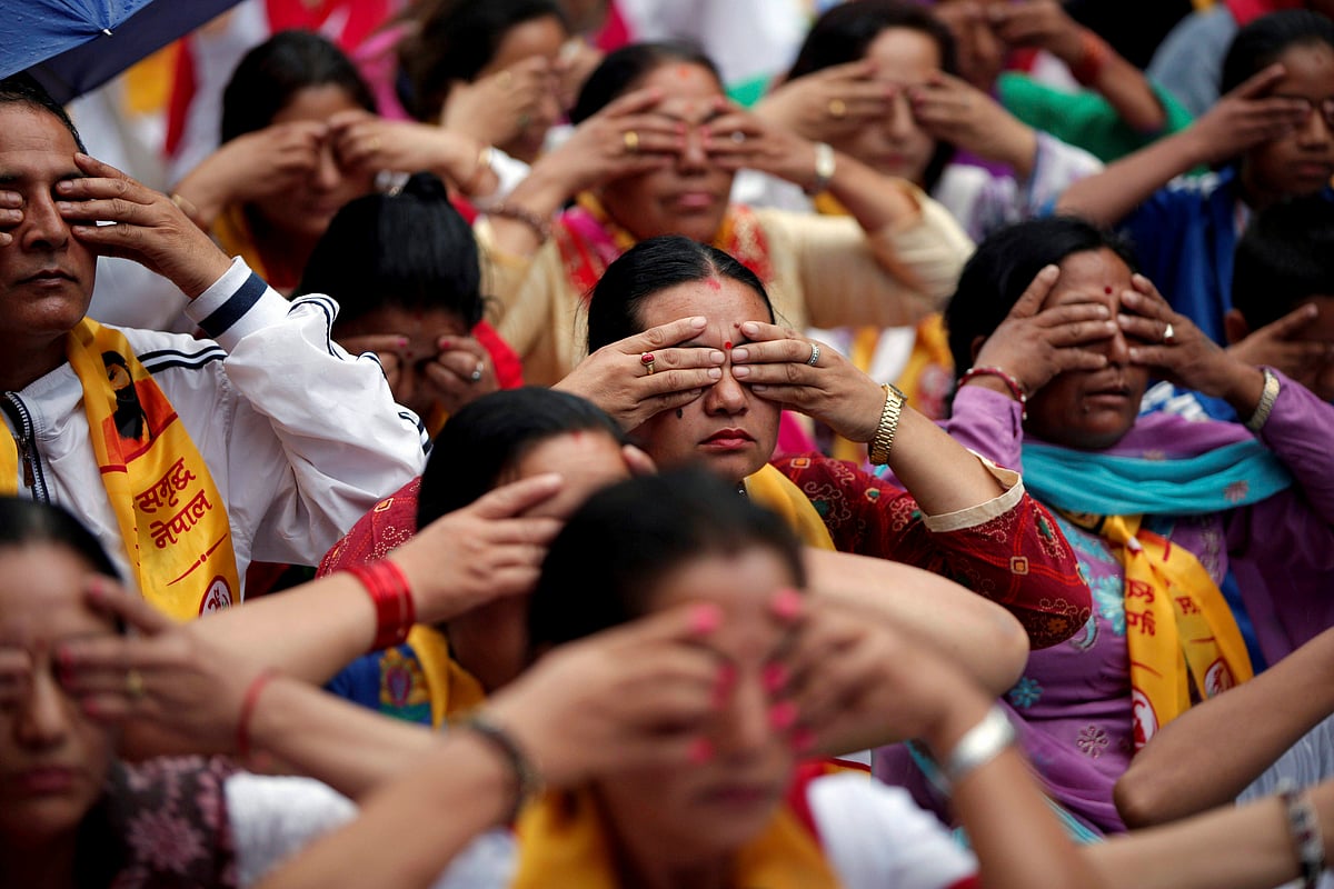 In Pics People Pause, Stretch and Pose for International Yoga Day