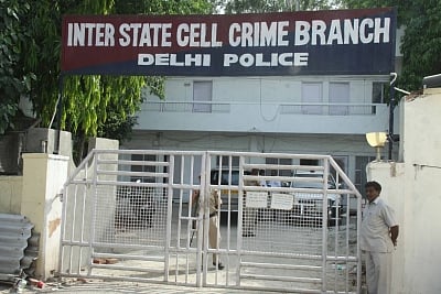 Man held for smuggling liquor in milk container
