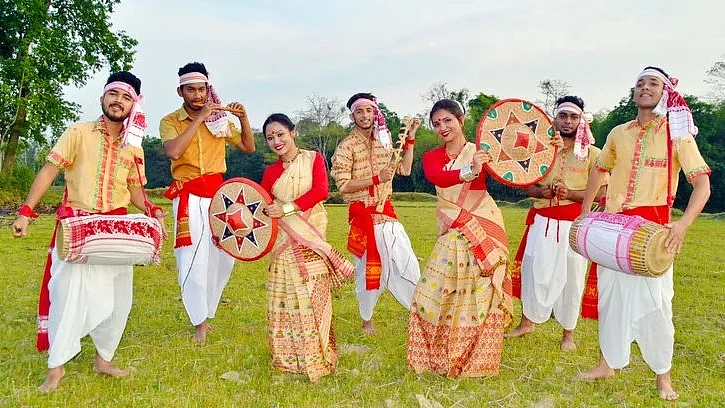 Assamese Bohag Bihu 2020 Wishes Images Cards And Messages In English farmer-offers-prayers-in-his-paddy-field-on-the-occasion-of-kati-bihu