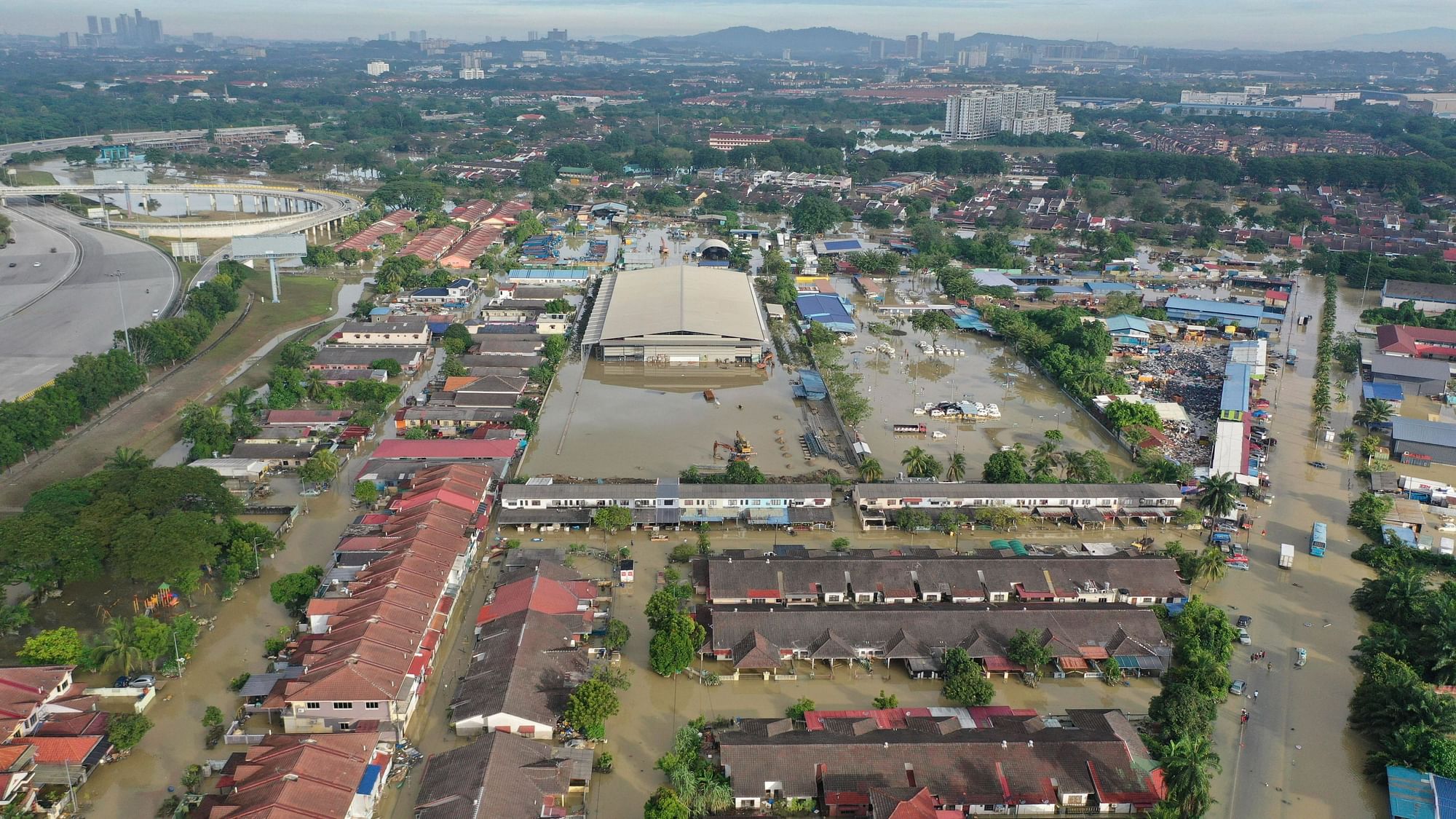 Over 14 Dead, 70,000 Displaced In Malaysia Floods